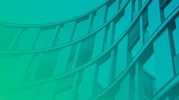 Outside of a modern building with a blue-green gradient overlay