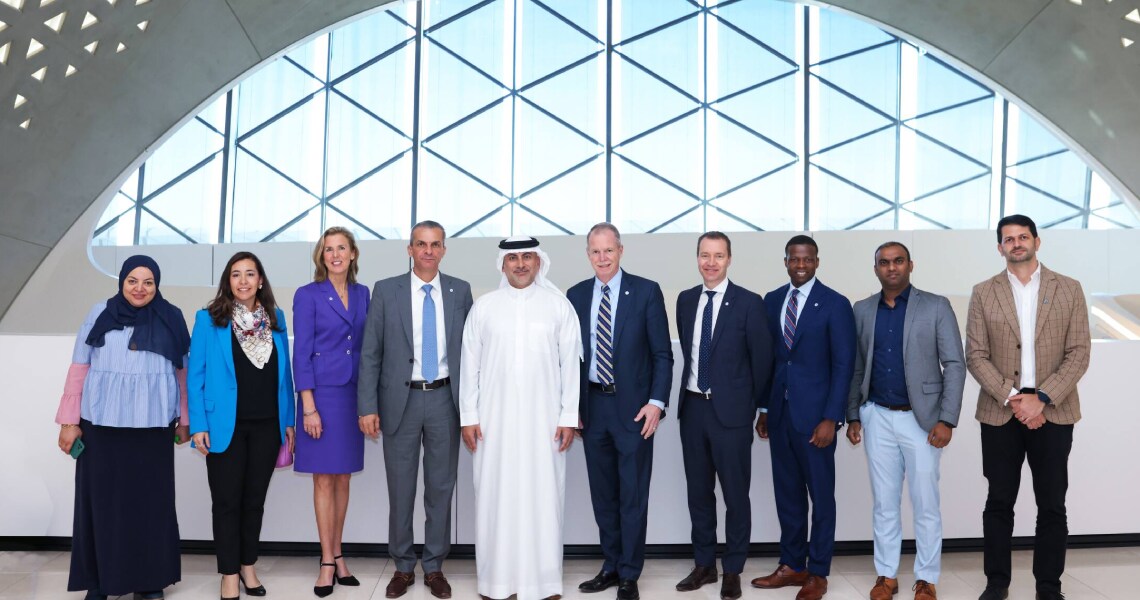 Group of people posing at the BEEAH Headquarters in Sharjah, UAE