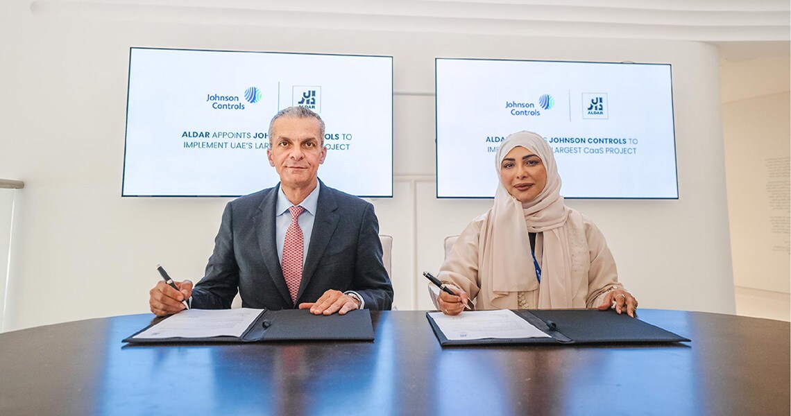 A man and woman at the launch of ‘Cooling as a Service’ Project in Abu Dhabi ok Santosh Mallick