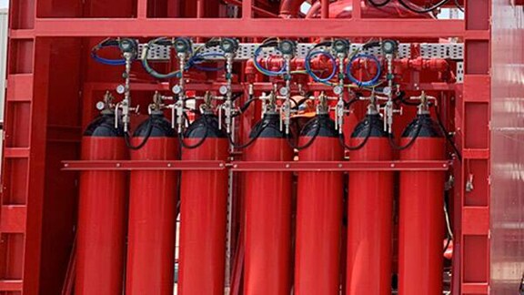 Fire extinguishers installed in a chemical skid unit