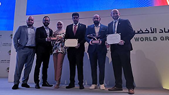 Six people holding certificates at the Emirates Energy Awards 2022