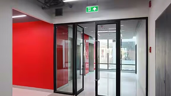 Glass doors leading to emergency exit