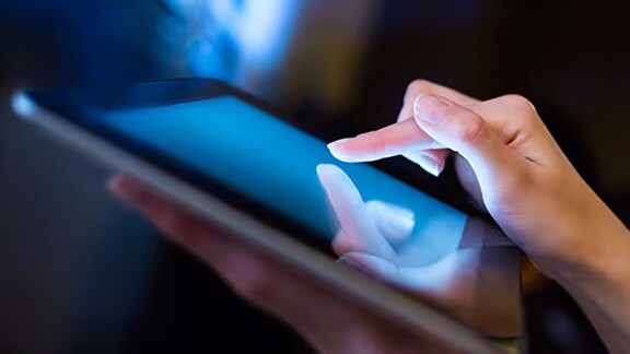 finger-tapping-on-control-panel