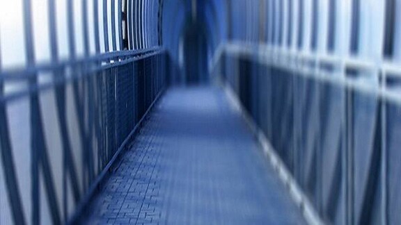 Dimly lit empty office corridor