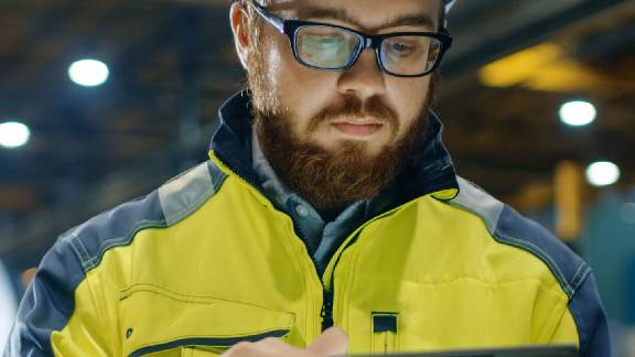 Service Person Checking machines.