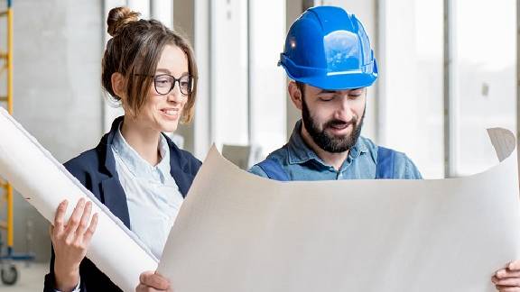 Two people discussing service plan.