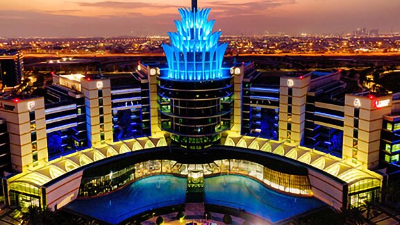 Hyatt Dubai Creek Heights lit up at night