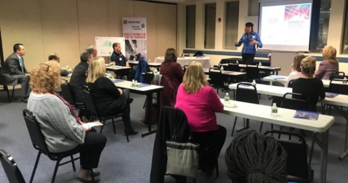 Women seated at a seminar hosted by Johnson Controls and Lincoln Tech