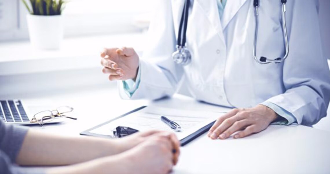 Healthcare professional talking to a patient