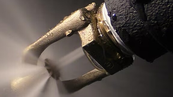Close-up of a fire sprinkler in action