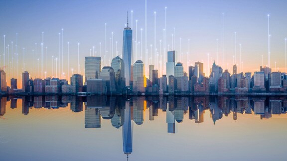 Skyline of a city during sunset with an orange overlay
