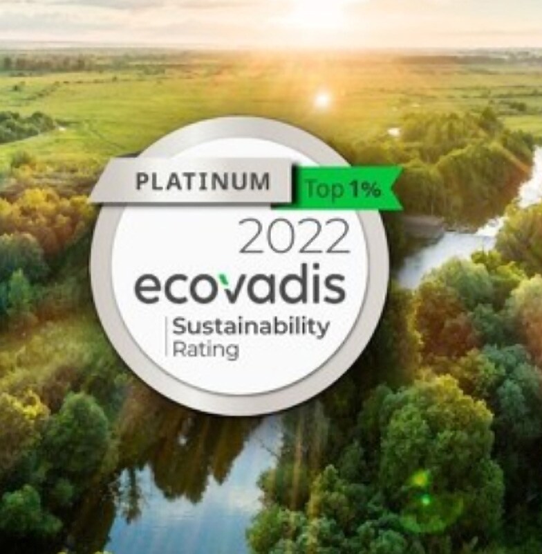 Aerial view of a forest, with a logo bearing a platinum rating by Ecovadis overlaid in the foreground