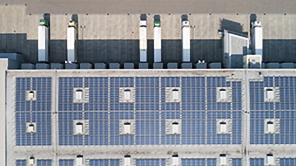 Bird's-eye view of solar panels in a solar farm