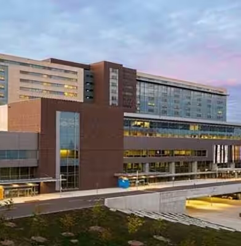 Exterior of a light brown hospital building