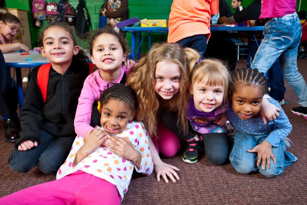 A group of girls smiling at the camera