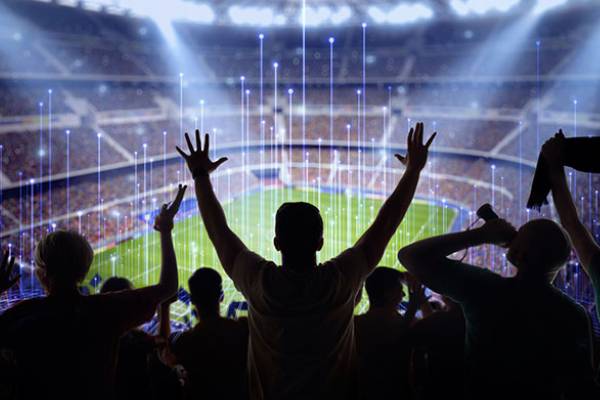 People cheering at a stadium